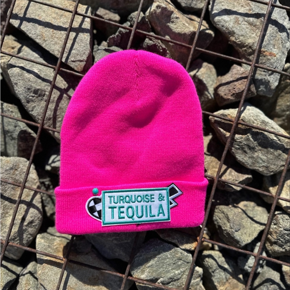 Bright pink beanie with iron on patches